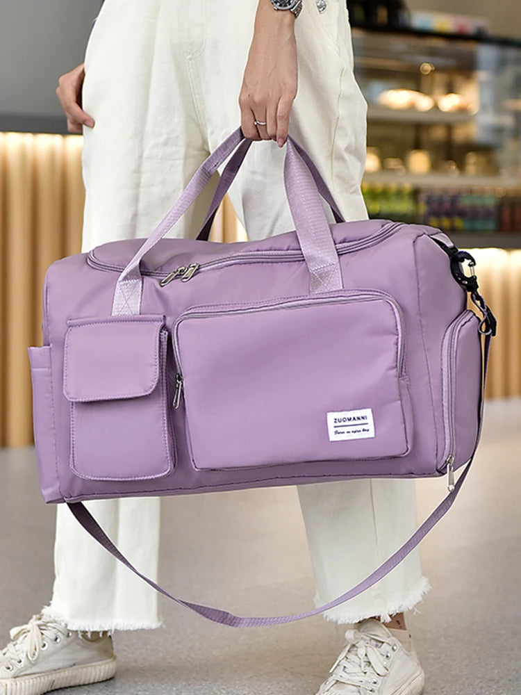 UNIXINU women’s weekender carry-on duffle bag with large storage space and separate shoe compartment, water-resistant design.
